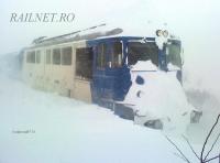 Imagine atasata: Masina 60-1115-9 cu trenul Regio 8081 inzapezit la 1km de Gara Catelu.jpg
